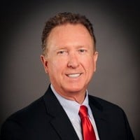 ALRDC Board of Directors member in professional portrait.